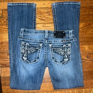 Vintage Miss Me Jeans wit sliver and navy embellished pockets with flare leg